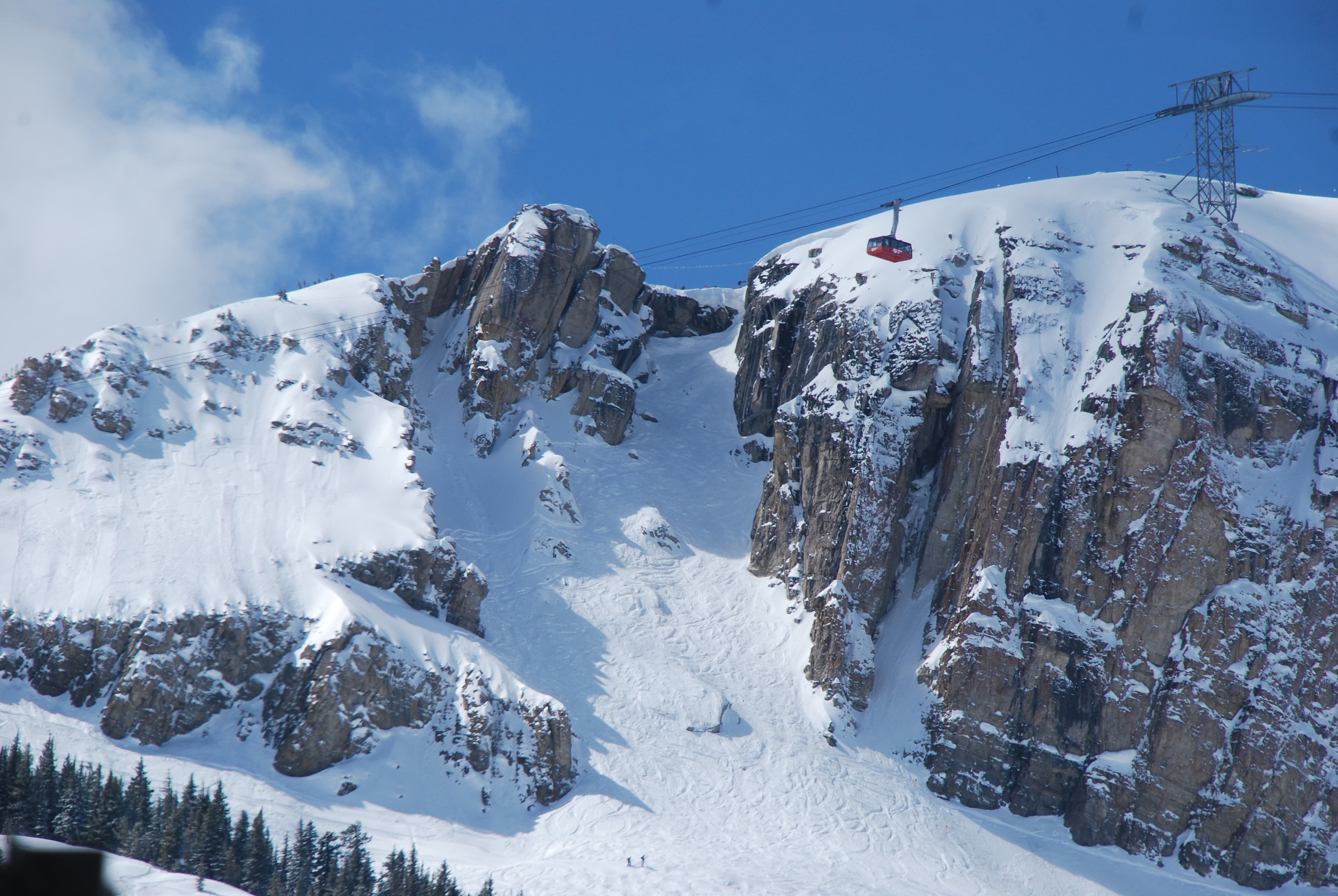Snow-covered Corbet's Couloir and the tram at Jackson Hole Mountain Resort